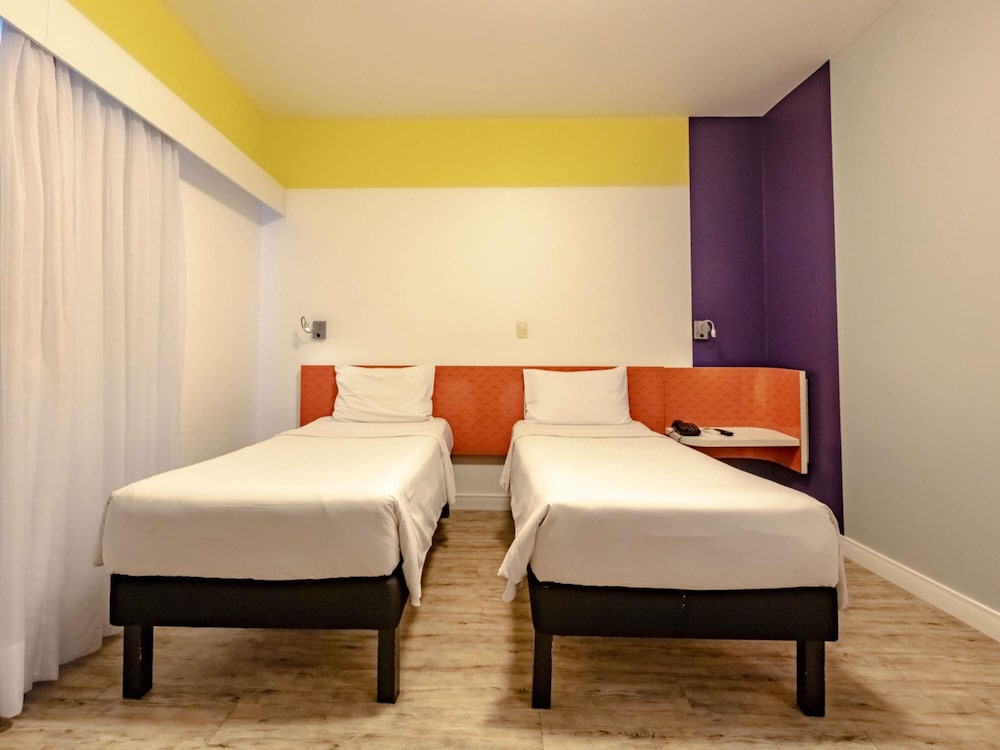 Apartamento Standard con dos camas individuales del hotel Ibis Styles Balneário Camboriú. Foto 7
