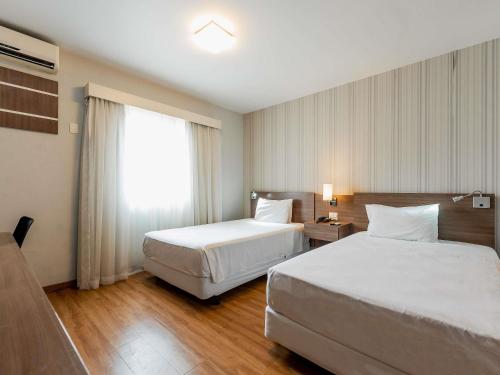 Apartamento Estándar con 2 camas individuales del hotel Ibis Styles Campinas Alphaville. Foto 1