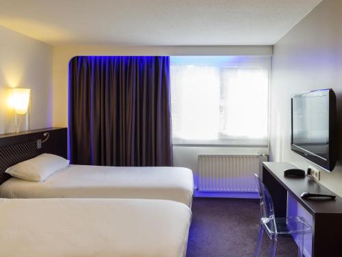 Habitación Doble Estándar - 2 camas del hotel Ibis Styles Lorient Caudan. Foto 4