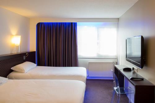 Habitación Doble Estándar - 2 camas del hotel Ibis Styles Lorient Caudan. Foto 7