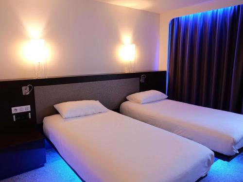 Habitación Familiar Estándar con sofá - 1 cama doble del hotel Ibis Styles Lorient Caudan. Foto 2