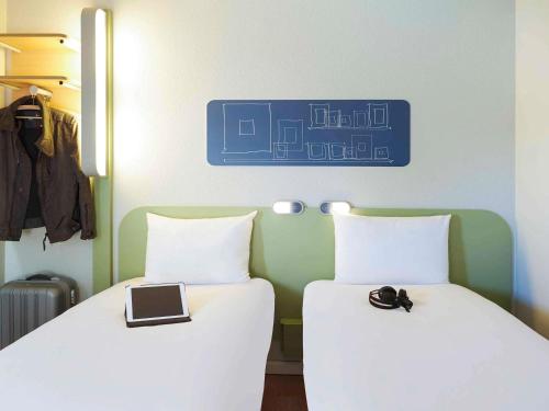Habitación Doble - 2 camas del hotel Ibis Budget Albi Terssac. Foto 2