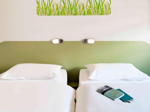 Habitación Doble - 2 camas del hotel Ibis Budget Albi Terssac. Foto 6