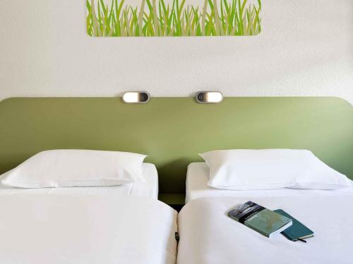 Habitación Doble - 2 camas del hotel Ibis Budget Albi Terssac. Foto 8