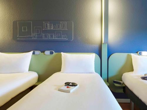 Habitación Doble - 2 camas del hotel Ibis Budget Albi Terssac. Foto 10