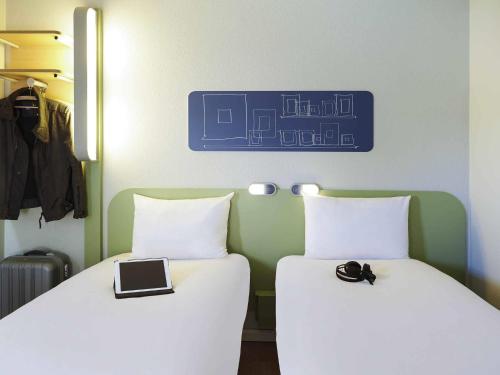 Habitación Doble - 2 camas del hotel Ibis Budget Albi Terssac. Foto 12