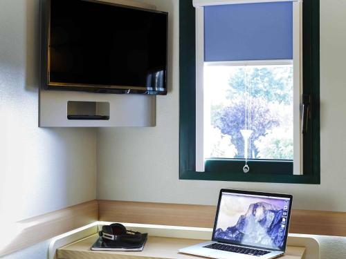 Habitación Triple del hotel Ibis Budget Albi Terssac. Foto 3