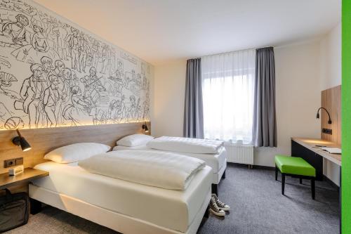 Habitación Estándar con 1 cama doble del hotel Ibis Styles Halle. Foto 4