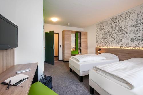 Habitación Estándar con 1 cama doble del hotel Ibis Styles Halle. Foto 10