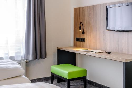 Habitación Estándar con 1 cama doble del hotel Ibis Styles Halle. Foto 11