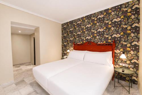 Habitación Doble del hotel Petit Palace Puerta de Triana. Foto 2