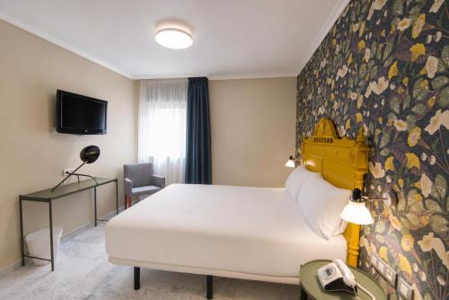 Habitación Doble del hotel Petit Palace Puerta de Triana. Foto 3