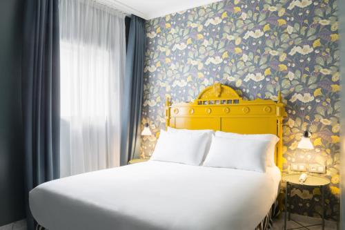 Habitación Doble del hotel Petit Palace Puerta de Triana. Foto 2