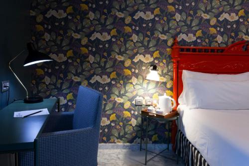 Habitación Doble del hotel Petit Palace Puerta de Triana. Foto 5