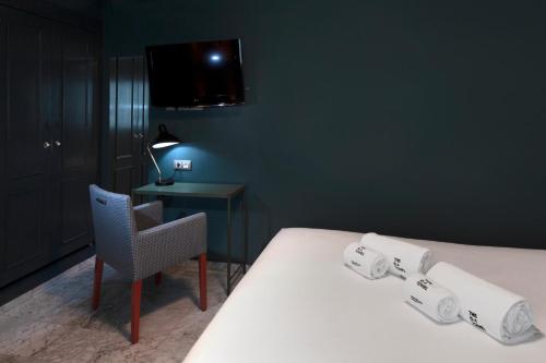 Habitación Doble Pequeña del hotel Petit Palace Puerta de Triana. Foto 1