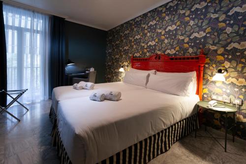 Habitación Doble con vistas a la ciudad del hotel Petit Palace Puerta de Triana. Foto 2