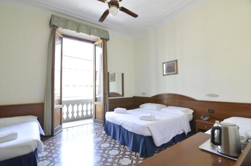 Habitación Cuádruple del hotel Palazzo Vecchio. Foto 5