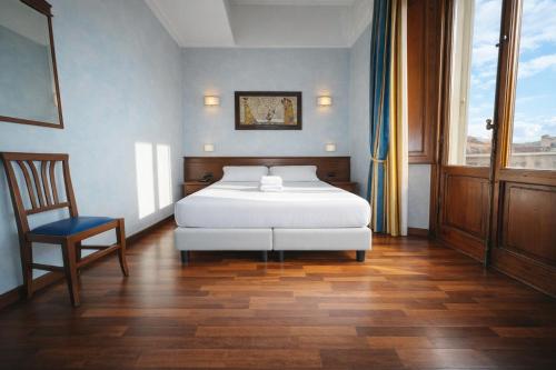 Habitación Doble con vistas a la catedral - 1 o 2 camas del hotel Palazzo Vecchio. Foto 5