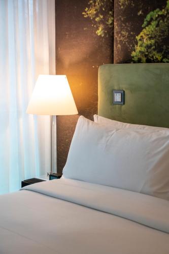 Habitación Familiar del hotel Doubletree By Hilton Lisbon - Fontana Park. Foto 4