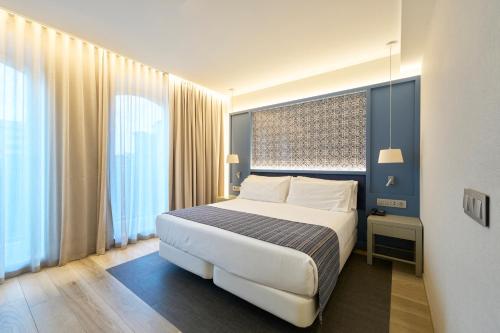 Habitación Doble con balcón - 1 o 2 camas del hotel Catalonia Porto. Foto 2