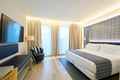 Habitación Doble con balcón - 1 o 2 camas del hotel Catalonia Porto. Foto 3