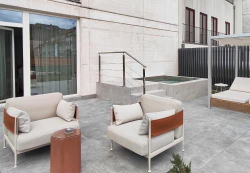 Habitación Doble Superior con terraza y piscina privada - 2 camas del hotel Catalonia Porto. Foto 1