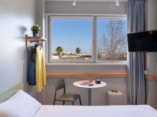 Habitación Doble Superior - 2 camas del hotel Ibis Budget Barcelona Viladecans. Foto 2