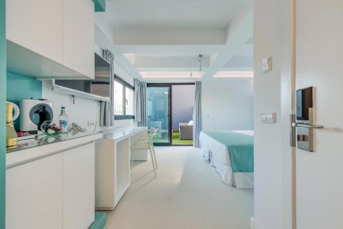 Suite Balcón o Terraza Vista ciudad Grand 1 Cama super king del hotel Hd Acuario Lifestyle. Foto 2