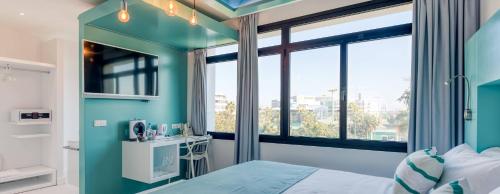 Habitación doble Vista Jardin Vista ciudad 2 Camas individuales 1 Cama super king del hotel Hd Acuario Lifestyle. Foto 3