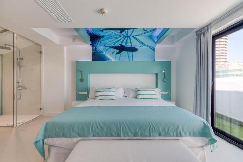 Suite Lujo Balcón o Terraza Vista ciudad Jacuzzi 1 Cama super king del hotel Hd Acuario Lifestyle. Foto 4