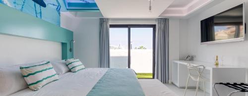 Suite Lujo Balcón o Terraza Vista ciudad Jacuzzi 1 Cama super king del hotel Hd Acuario Lifestyle. Foto 5