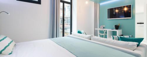 Suite con balcón del hotel Hd Acuario Lifestyle. Foto 5