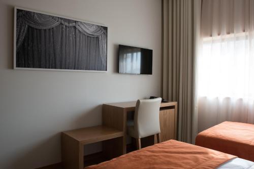 Habitación Doble Estándar - 2 camas del hotel Porto Coliseum. Foto 6