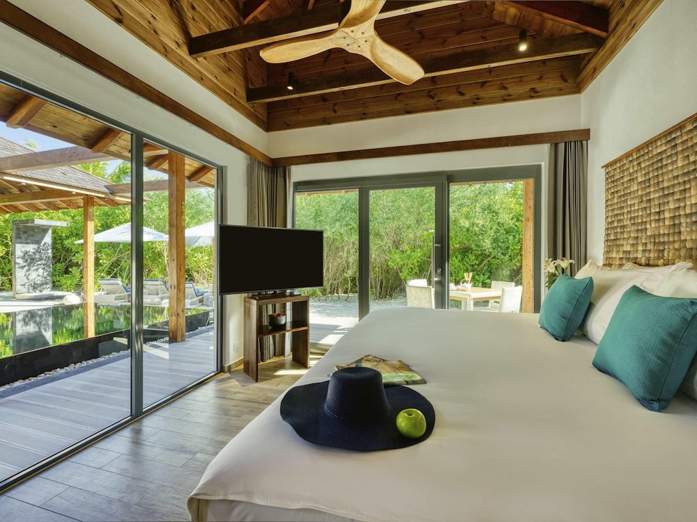 Residencia en la playa con piscina de cuatro dormitorios del hotel Kuredhivaru Resort and Spa Maldives. Foto 5