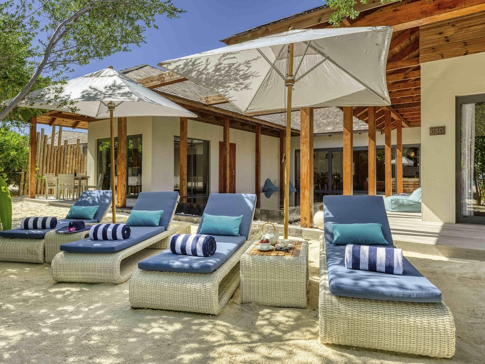 Residencia en la playa con piscina de cuatro dormitorios del hotel Kuredhivaru Resort and Spa Maldives. Foto 8