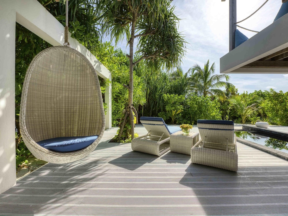 Residencia en la playa con piscina de cuatro dormitorios del hotel Kuredhivaru Resort and Spa Maldives. Foto 9