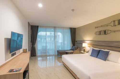 Alojamiento Deluxe con acceso a la piscina - 1 cama extragrande del hotel Centara Ao Nang Beach Resort and Spa Krabi. Foto 1