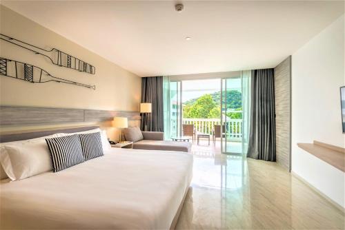 Alojamiento Premier con cama extragrande del hotel Centara Ao Nang Beach Resort and Spa Krabi. Foto 1