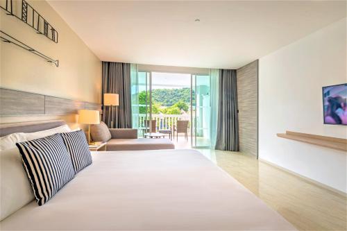 Habitación Doble Premier con 2 camas dobles del hotel Centara Ao Nang Beach Resort and Spa Krabi. Foto 3