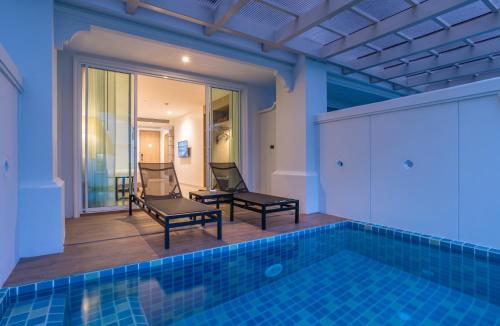 Alojamiento Premium Deluxe con piscina y terraza - 1 cama extragrande del hotel Centara Ao Nang Beach Resort and Spa Krabi. Foto 4