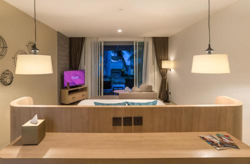 Alojamiento Premium Deluxe Esquinero con piscina - 2 camas dobles del hotel Centara Ao Nang Beach Resort and Spa Krabi. Foto 2