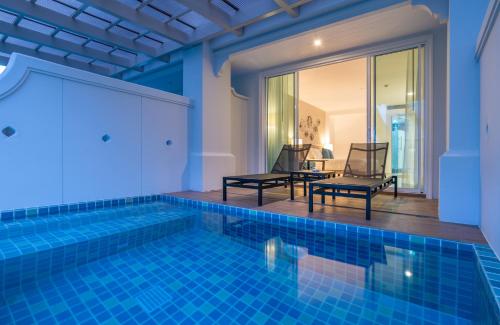 Alojamiento Premium Deluxe con piscina y terraza - 2 camas dobles del hotel Centara Ao Nang Beach Resort and Spa Krabi. Foto 4