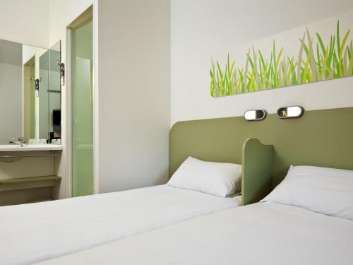 Habitación Doble Estándar - 2 camas del hotel Ibis Budget Birmingham Centre. Foto 8