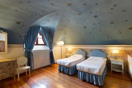 Borgo One - Bedroom del hotel Tenuta Di Artimino. Foto 7