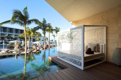 Suite Junior Swim Up del hotel TRS Coral Costa Mujeres. Foto 1