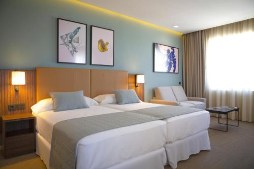 Habitación Deluxe Superior Twin - 2 camas individuales del hotel RIU Plaza España. Foto 3