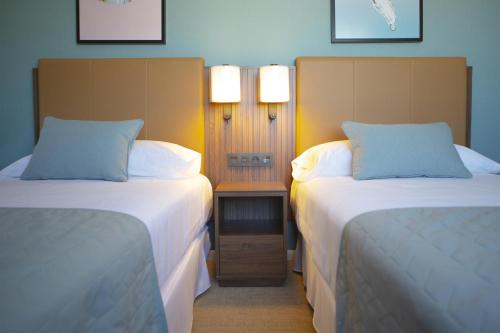 Habitación Deluxe Twin - 2 camas individuales del hotel RIU Plaza España. Foto 1