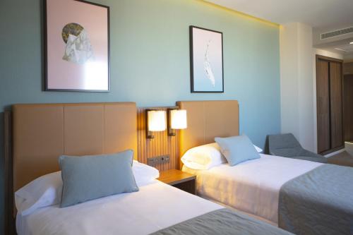 Habitación Deluxe Twin - 2 camas individuales del hotel RIU Plaza España. Foto 5