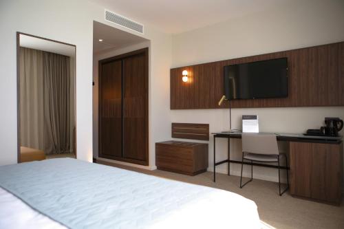 Deluxe King Room del hotel RIU Plaza España. Foto 1