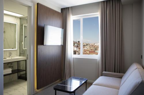 Deluxe Family Twin Room del hotel RIU Plaza España. Foto 1